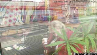 Young guy picks up long mature grandmother for play