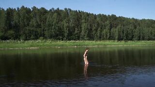 Naked inside Volga River