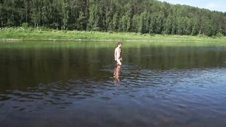 Naked inside Volga River