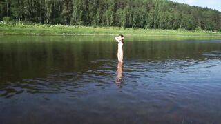 Naked inside Volga River
