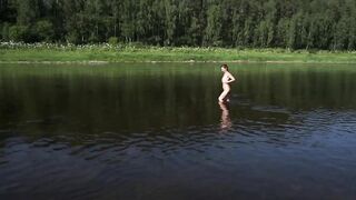 Naked inside Volga River