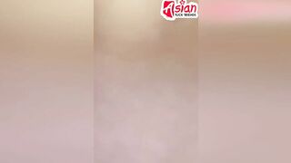 Amateur Thai lesbo fucks small vibrator