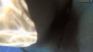 Jacqueline Hope liking being nude into the pool