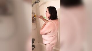 Naomi takes a shower