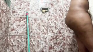 Dark Hair with huge tits, showing off inside the bath-tub!
