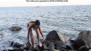 Totally nude on the beach