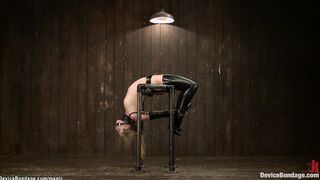 Shackled blond butt hooked on the floor