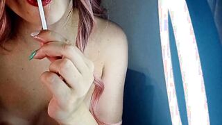 A LITTLE BITCH BLOWS A LOLLIPOP AND SHOWS HER TITTED