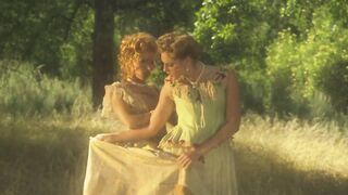 Sensual lesbians romance passionately inside the wild