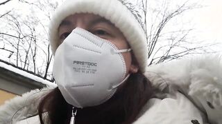 On a cold day Nicoletta pees on herself inside the street