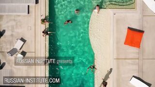 Lesbo three-way around the pool