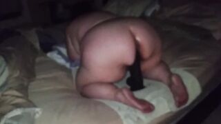 Huge woman using huge toy