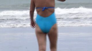 Mother with her stepson enjoy the beach and into the