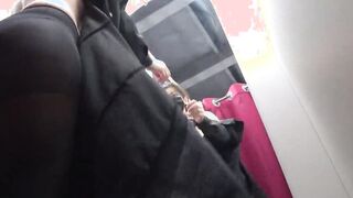 A concealed camera into a fitting room spies on a