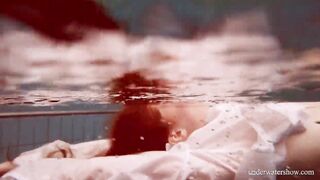 Huge boobs red haired Lola underwater naked