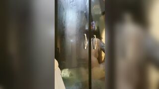 Having fun inside the shower with music