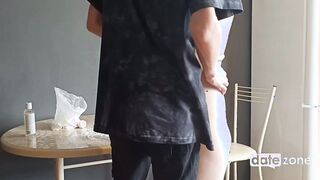 Young fiance boned on table inside the kitchen