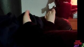 Moving toes on the leather sofa
