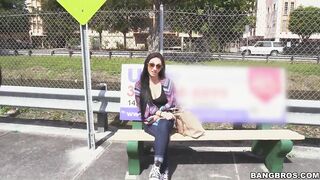 She's waiting at the bus stop and a man surprises her.