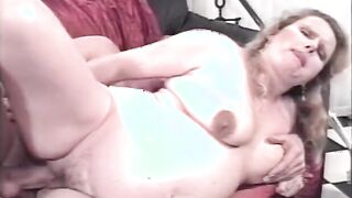 Blonde deepthroats penis on her knees