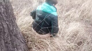 She pissed under a tree. Piss pouring out of twat