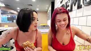 2 younggirls decide to got ready into McDonald's and take