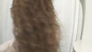 Red Haired BBW with milky skin slips on a strip performance and plays