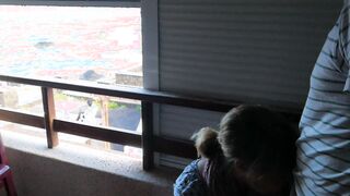 Balcony fellatio really near the people