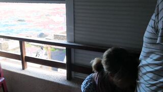 Balcony fellatio really near the people