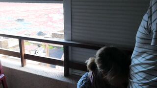 Balcony fellatio really near the people