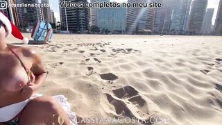 Mamma Claus showing off at the seaside and a little