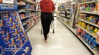 Mom grocery shopping into transparent pants
