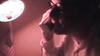 Cougar on the bed blows on a penis