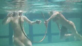 Russian lesbo girls swimming into the pool