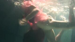 Russian lesbo girls swimming into the pool