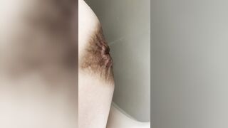 Old woman with saggy titties undressing and pee inside WC