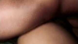 Ebony chick swallows a long black dick into her wide mouth