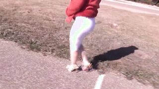 Long butts inside white pants.
