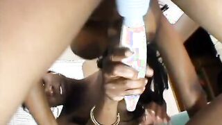 Bae ebony skank sticks a dildo on her friends soak vagina