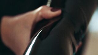 Gf putting on rubber outfit