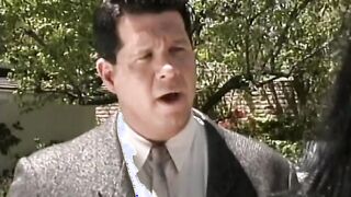 Big-haired red head gags on stiff thick dick
