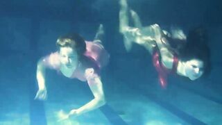 Lesbians and solo girls make out underwater