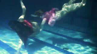 Lesbians and solo girls make out underwater