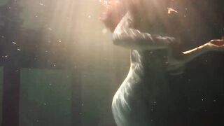 Lesbians and solo girls make out underwater