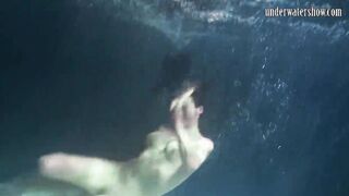 Lesbians and solo girls make out underwater