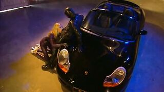 Blonde vixen inside rubber gets rough pounding inside a vehicle park