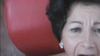 A big cumshot on a sexy granny face