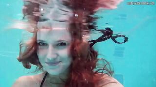 Nikita Vodorezova shows off her Bombshell body underwater