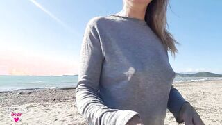 nippleringlover walking on the beach and flashing pierced breasts with