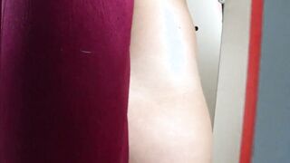 Voyeur with secret camera peeping on a posh ass inside